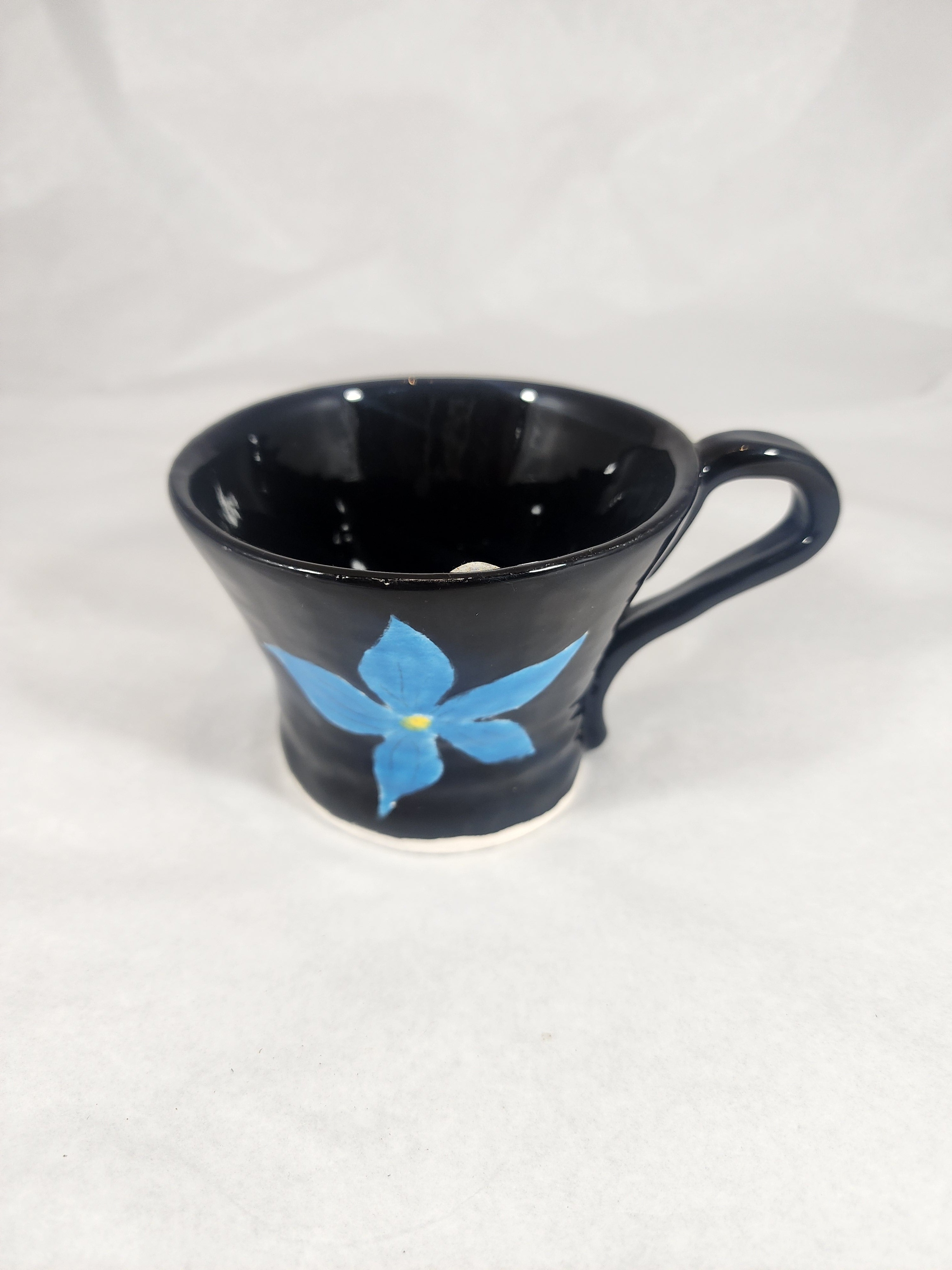 Black Cup with Hibiscus Flower