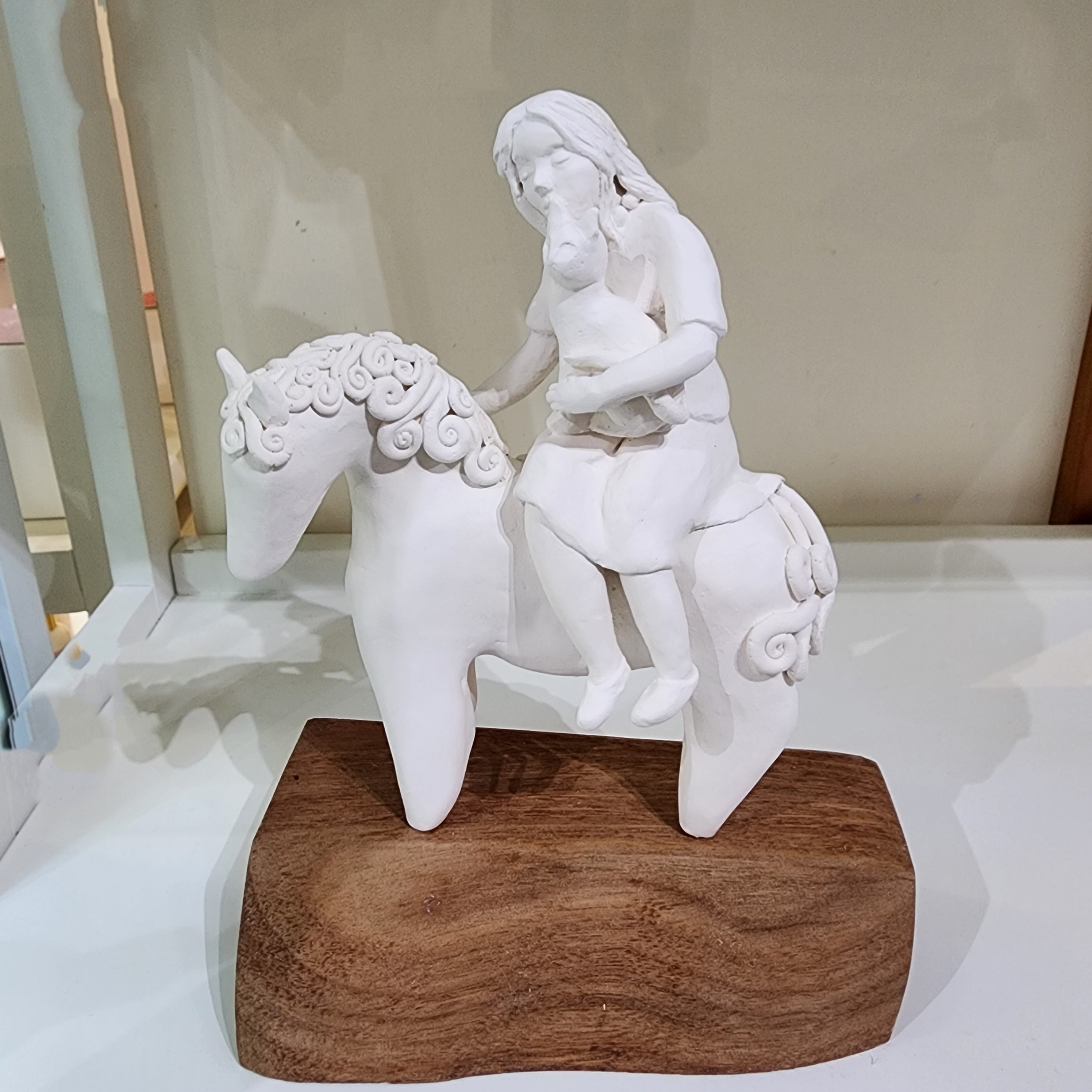 Little Girl on a Rocking Horse