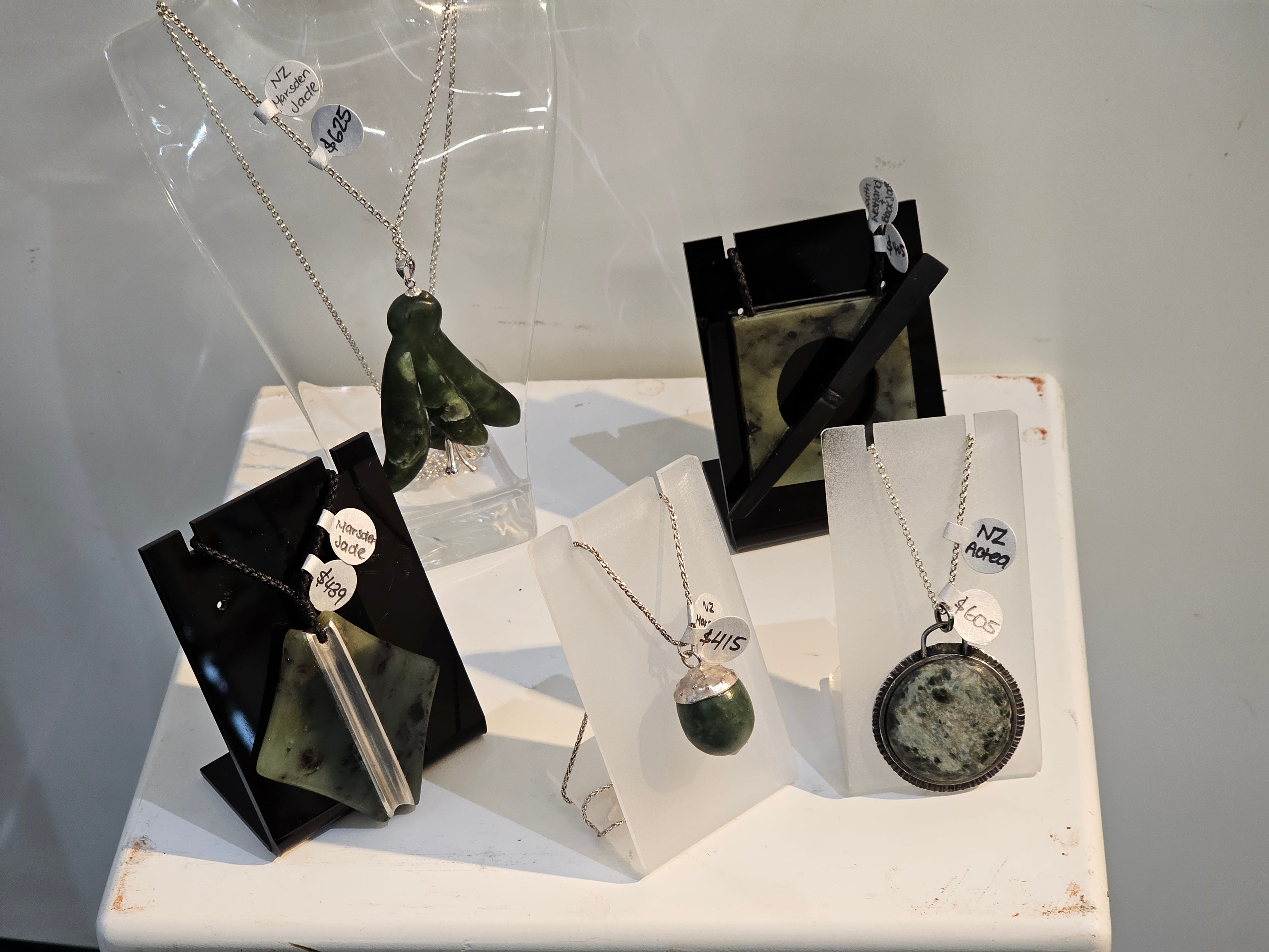 Jade and Form Pendants from $405