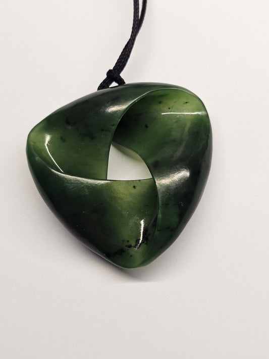 Pounamu Moebius Ribbon Carving