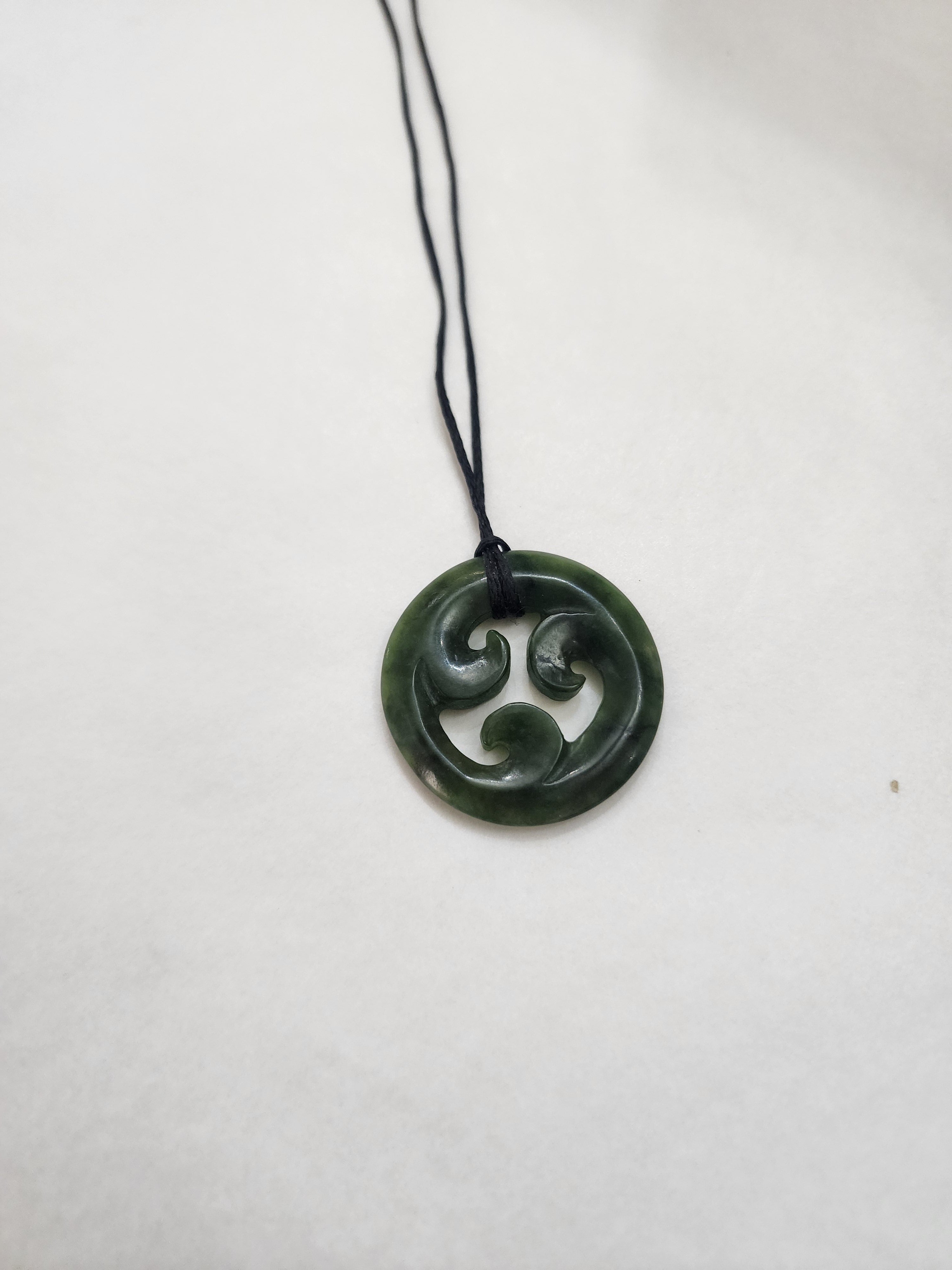 Korus in Small Circle Pendant - Pounamu